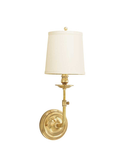 Logan 1-Light Wall Sconce in Aged Brass.